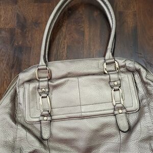 B. Makowsky gold purse with dust bag